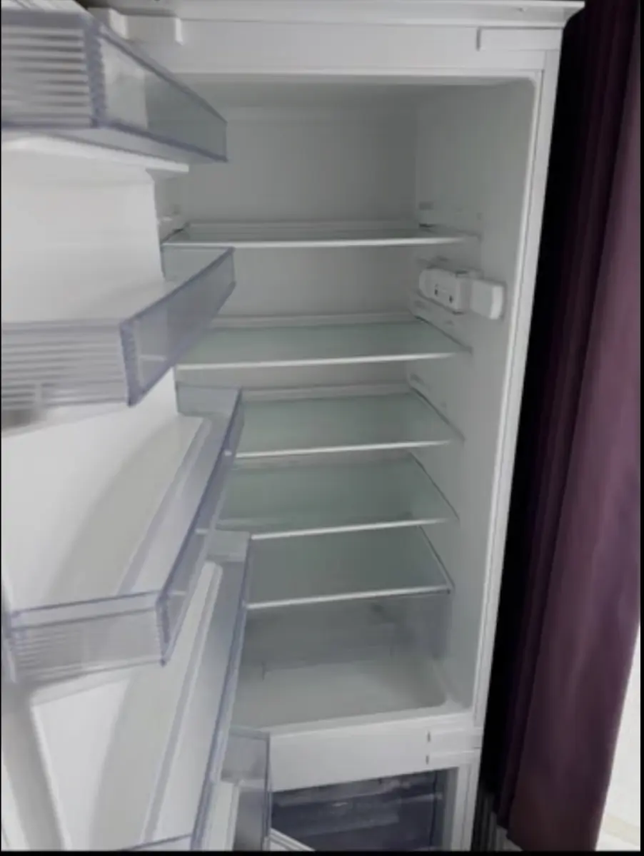Integrated fridge freezer